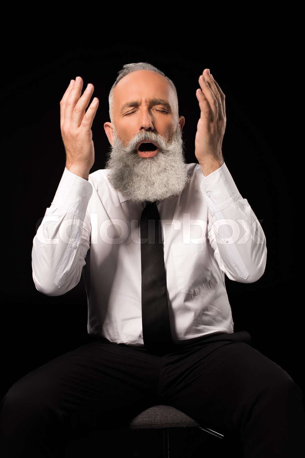 Man throwing hands up Stock image Colourbox