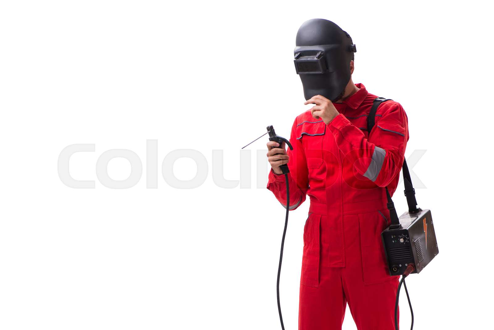 Young repairman with a welding gun electrode and a helmet isolat