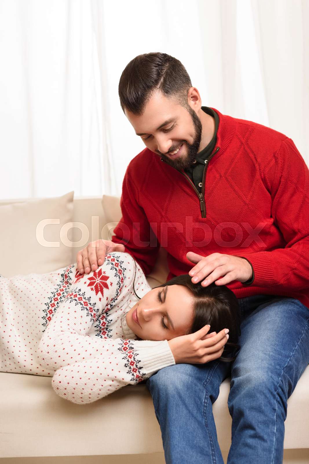 girl sleeping on knees of boyfriend Stock image Colourbox