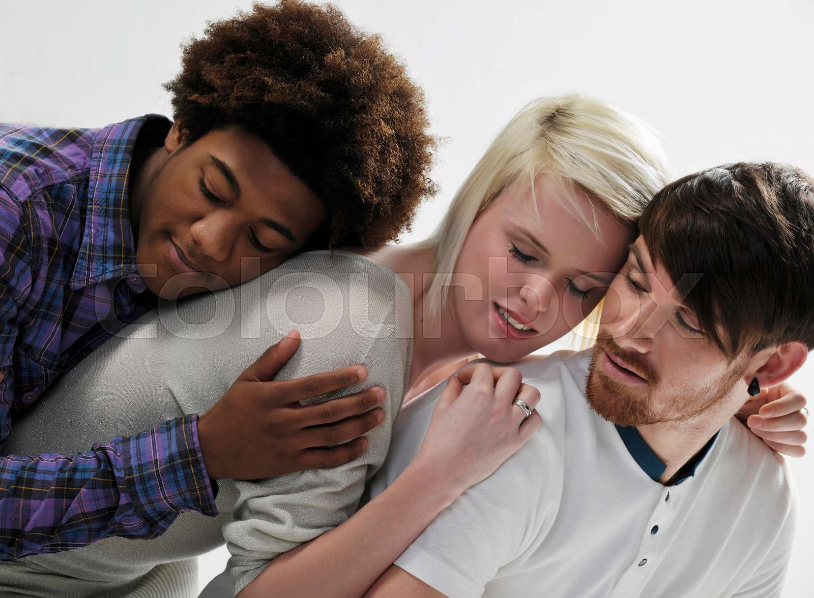 3-young-people-leaning-on-each-other-stock-image-colourbox