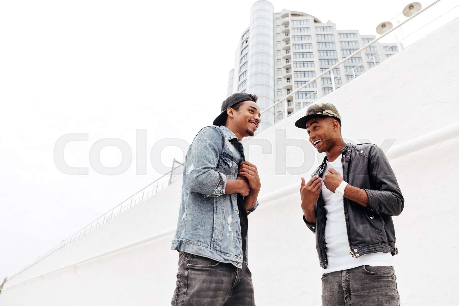 African men friends walking outdoors | Stock image | Colourbox