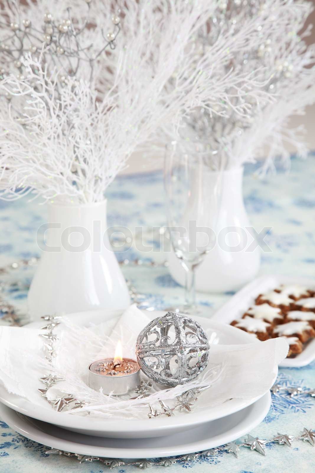 Christmas table setting in white and silver tone | Stock image | Colourbox