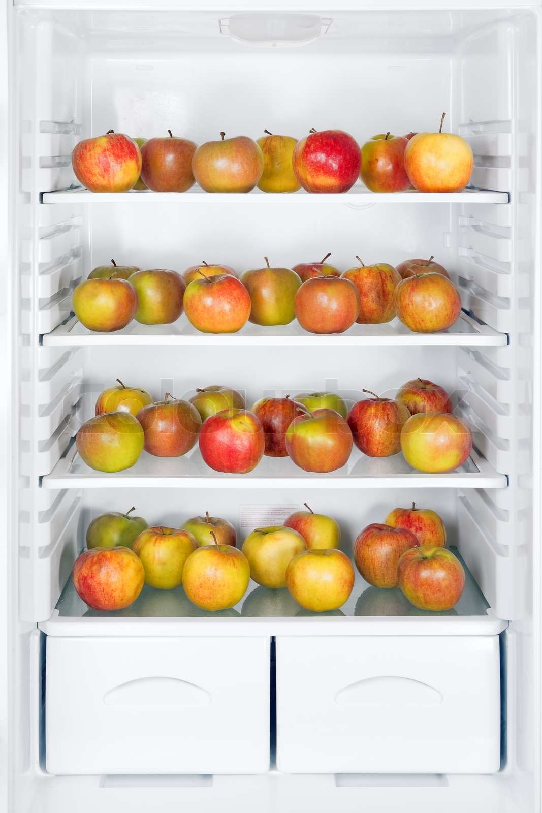 apples in the refrigerator Stock image Colourbox