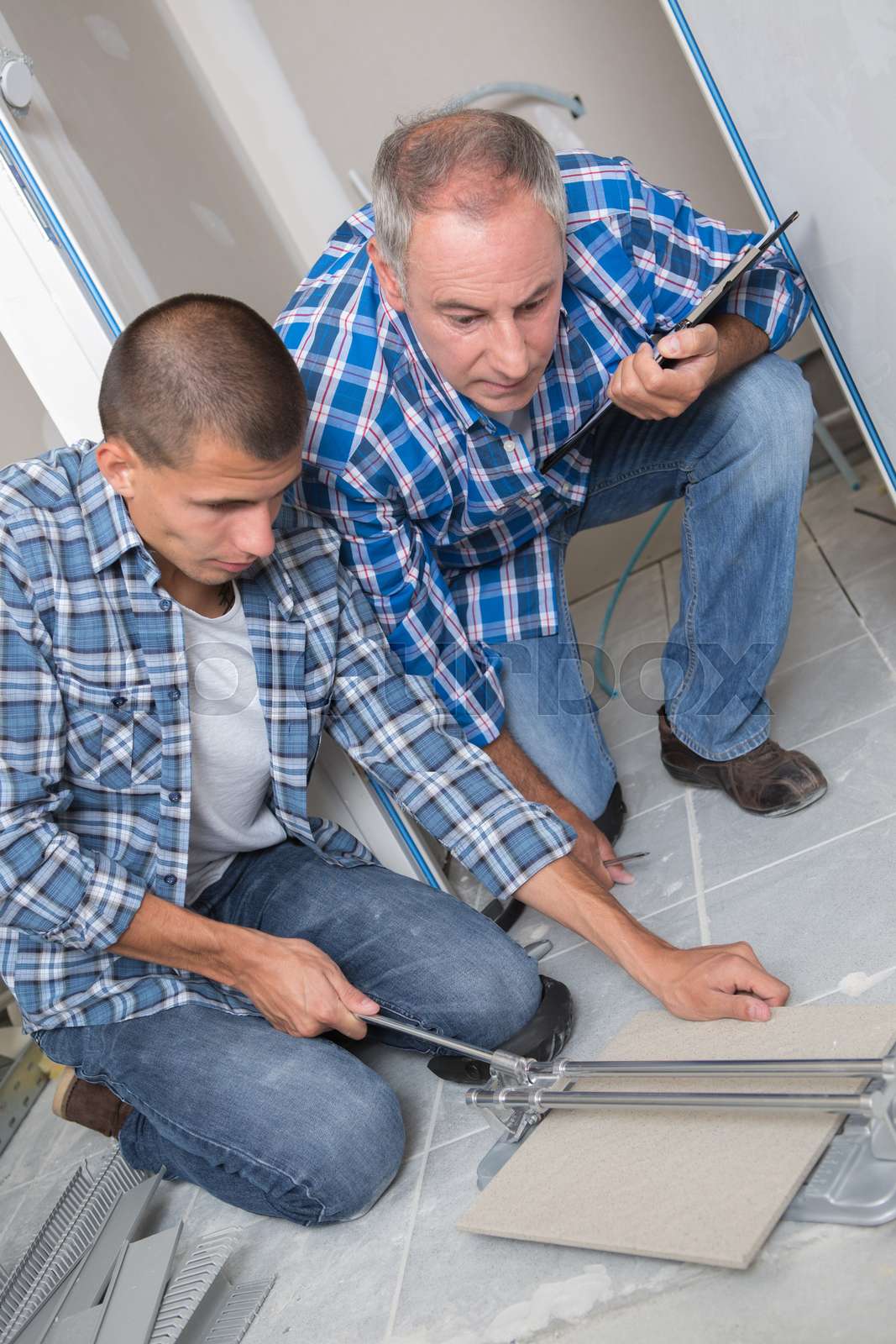 tile-setter-sorting-the-tiles-stock-image-colourbox