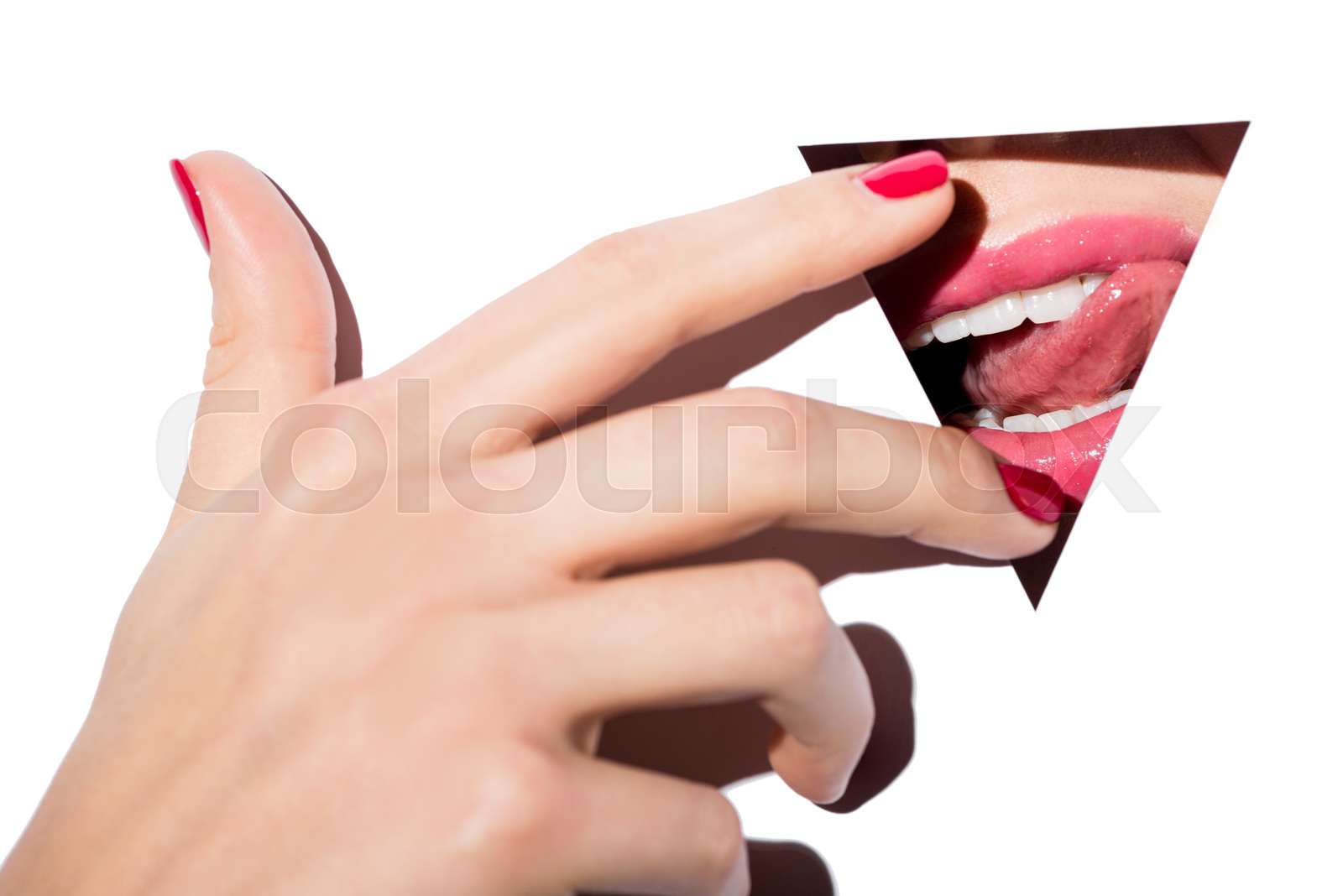woman lips behind triangle hole | Stock image | Colourbox
