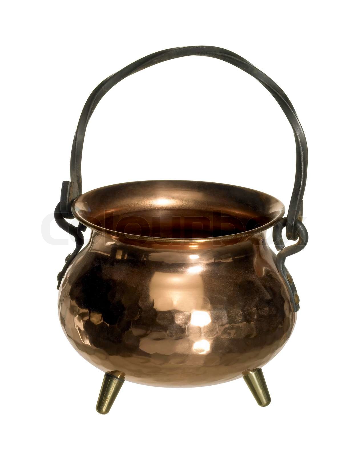 studio photography of a small copper cauldron isolated on white, with