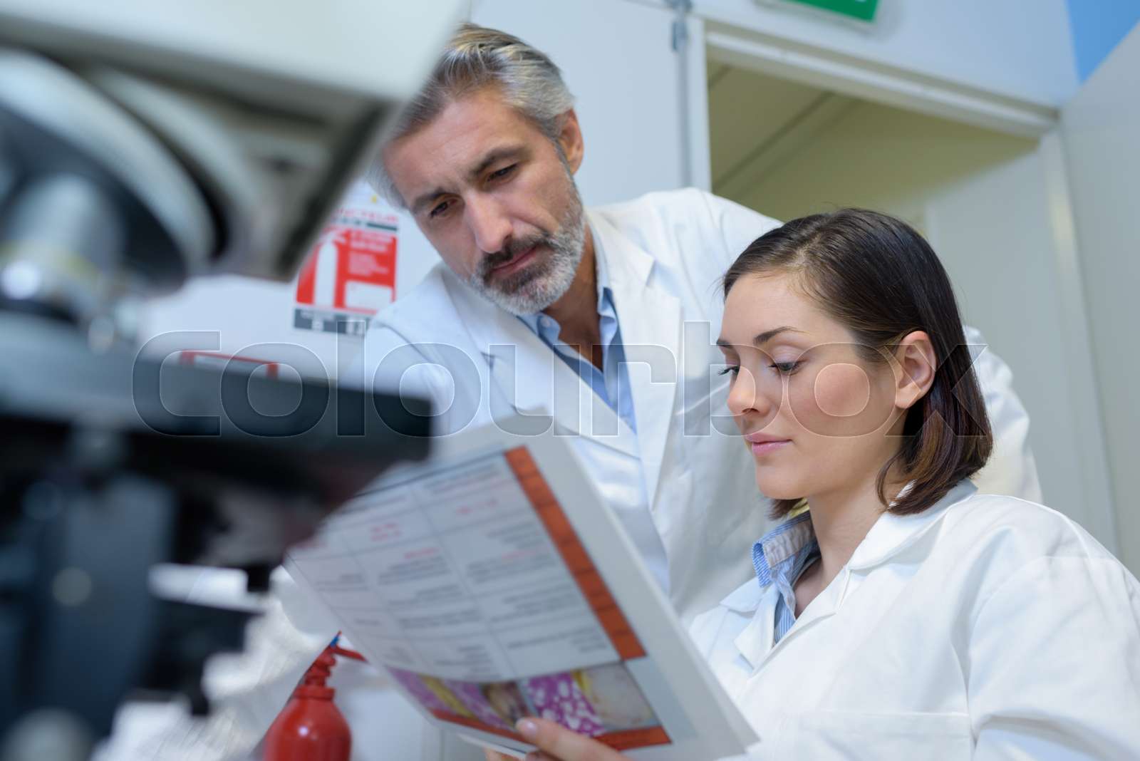 Reading The Latest Health Breakthrough Stock Image Colourbox