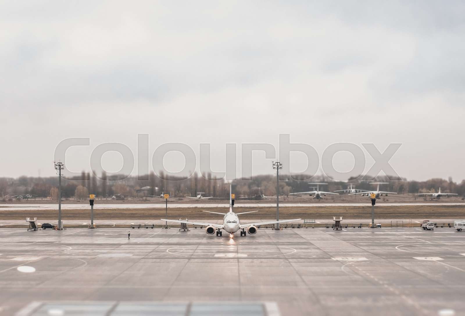 Airplain in airport | Stock image | Colourbox