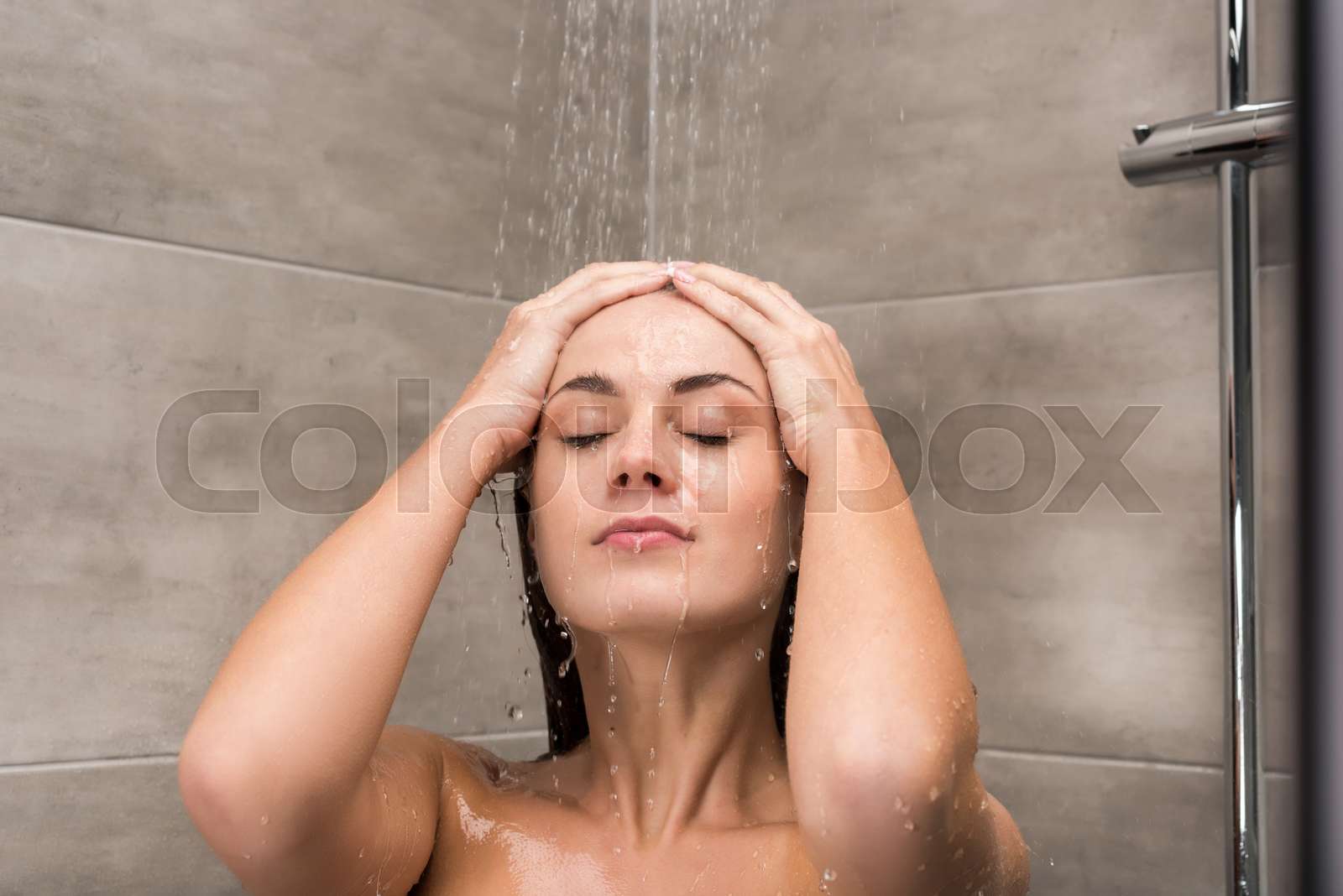 woman taking shower Stock image Colourbox