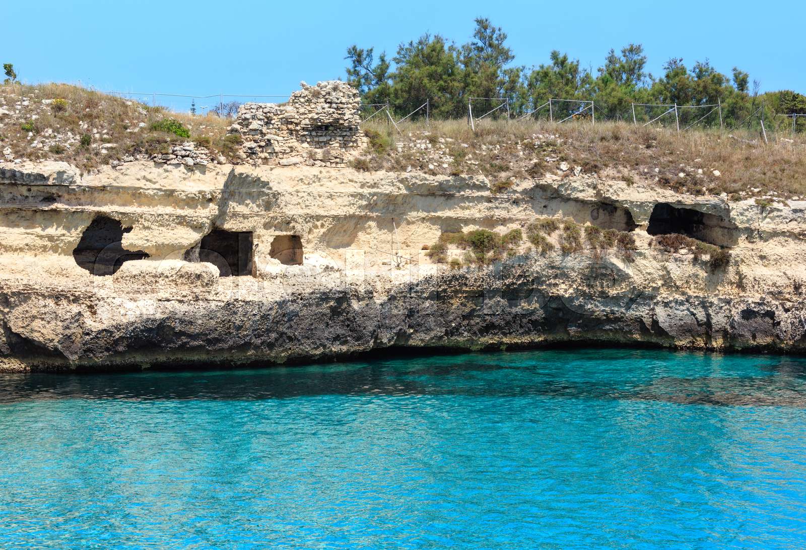 Sea coast Archaeological Area of Roca Vecchia, Italy Stock image