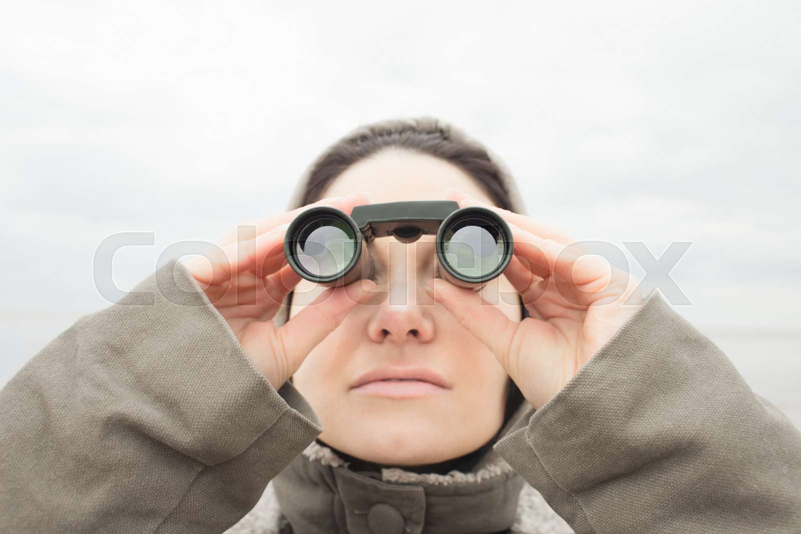 Woman with Binoculars Stock image Colourbox