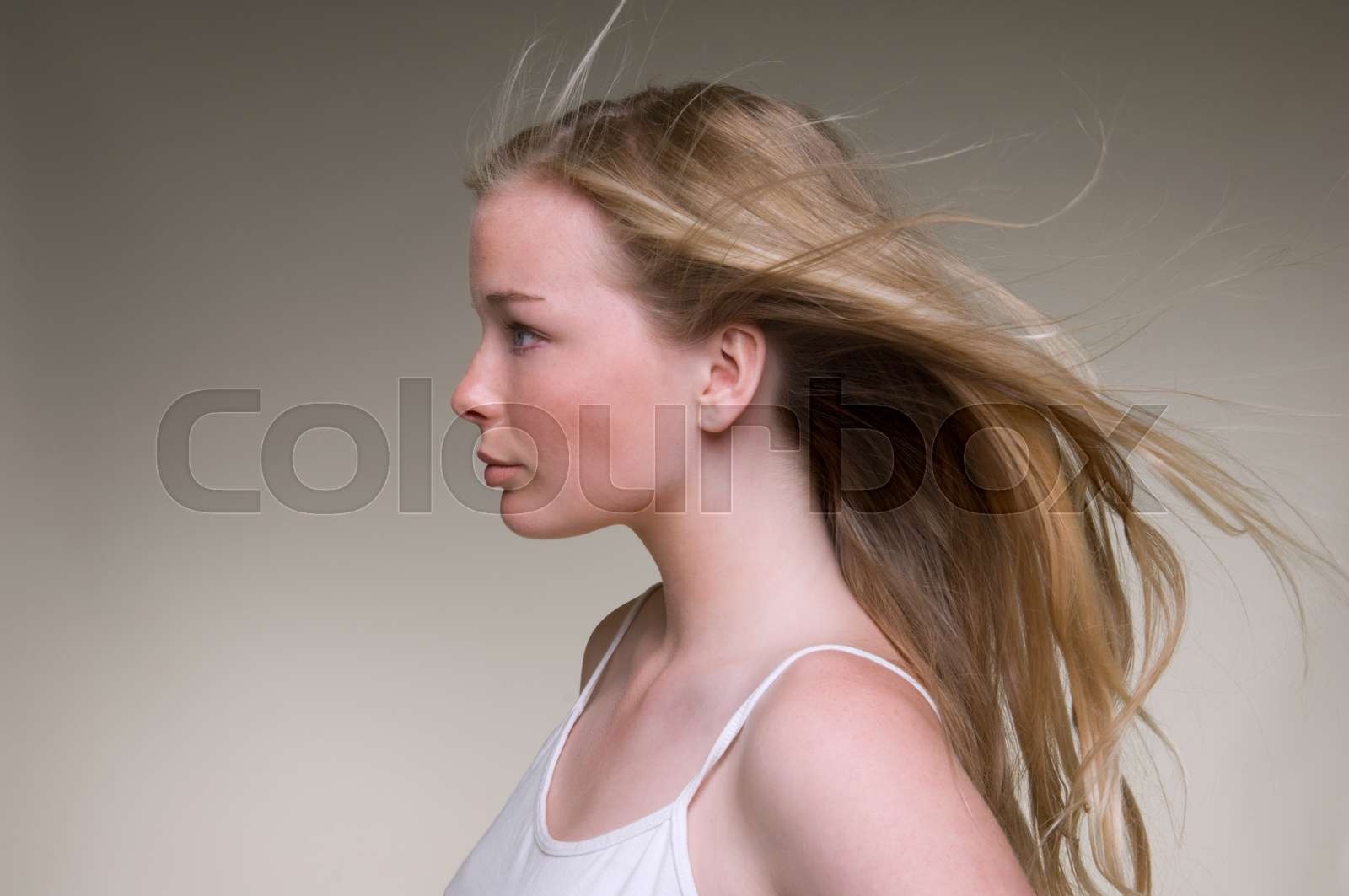 Teenage girl s hair blowing in wind stock image colourbox