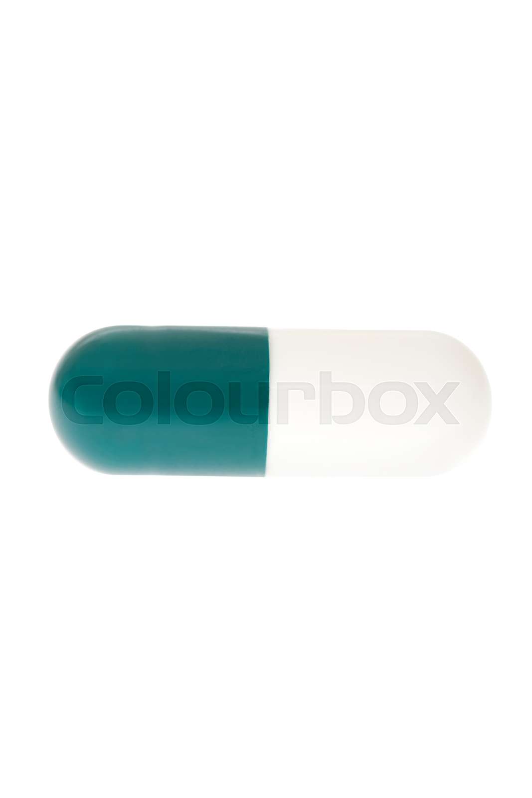 Green and white capsule | Stock image | Colourbox