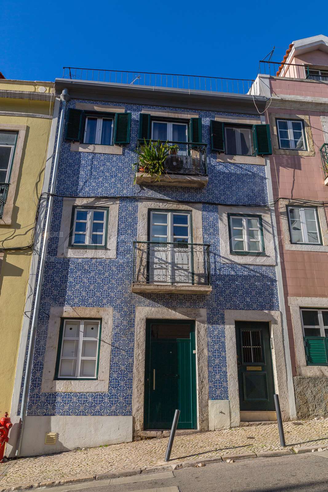 Colorful houses front in the center of Lisbon Stock image Colourbox