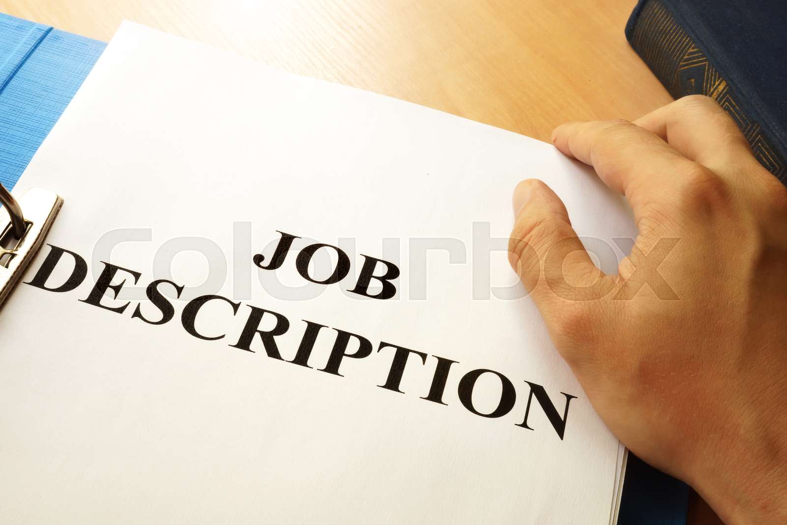 Folder with title Job Descriptions. Stock image Colourbox
