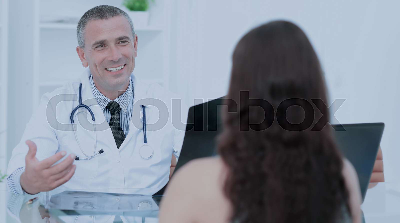 family doctor counsels the patient and discusses with her the re