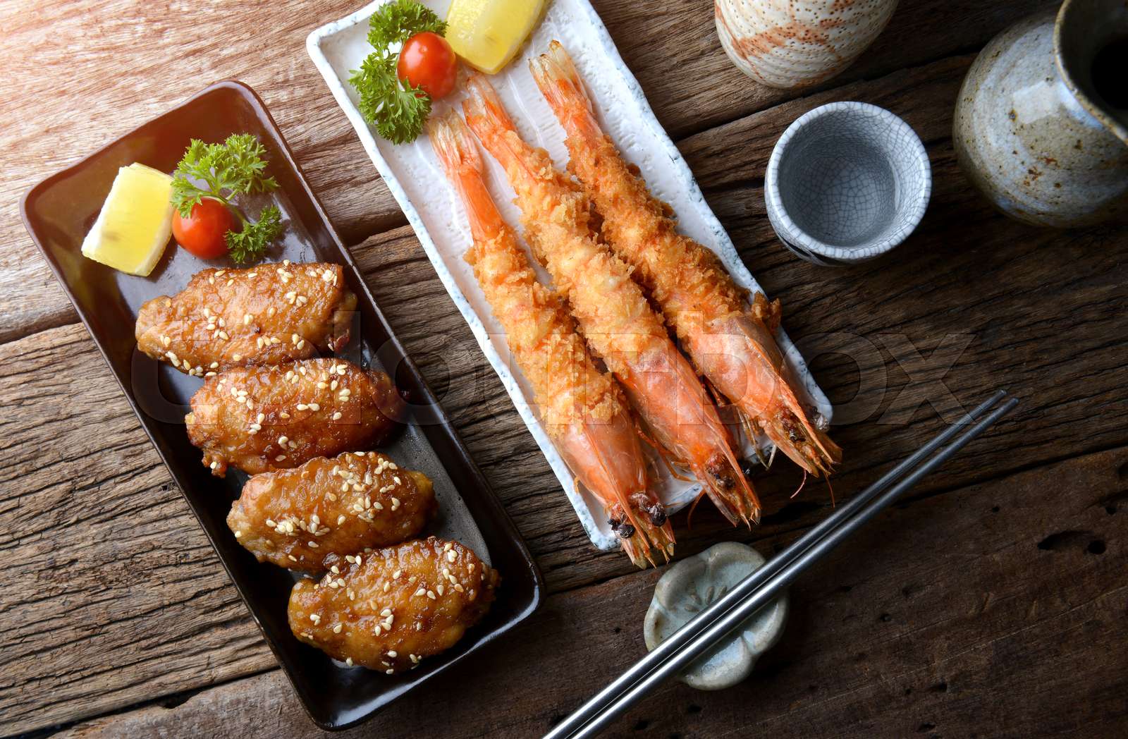 Deep fried shrimp and fried chicken wing. | Stock image | Colourbox