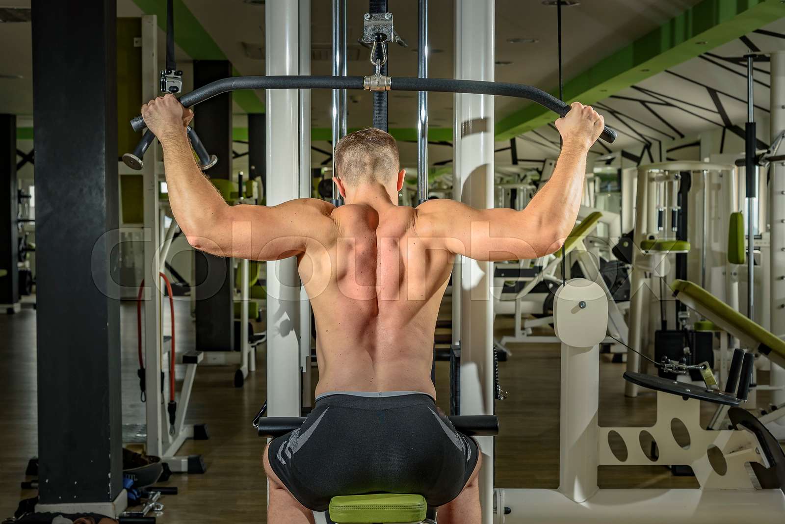 Shoulder pull down exercise | Stock image | Colourbox