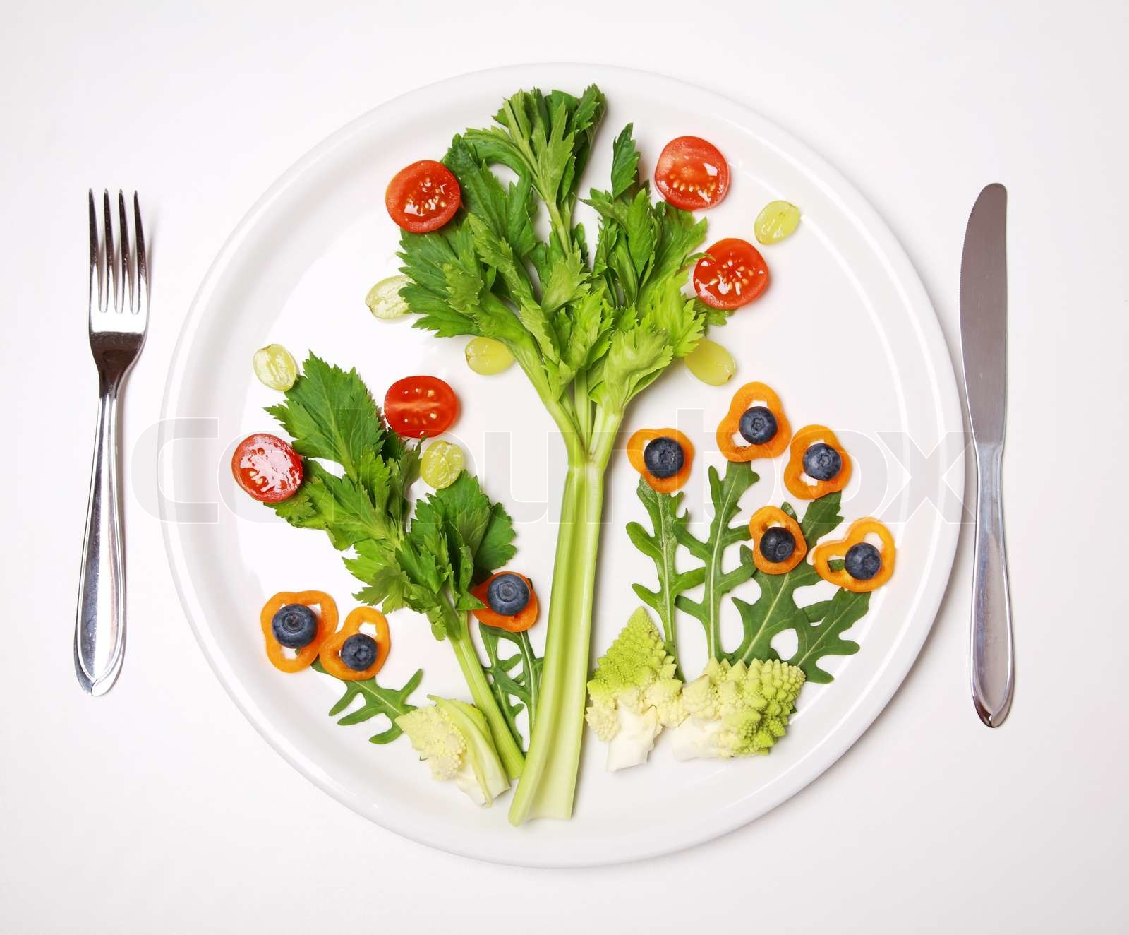 Concept of healthy food plate with vegetables and fruits as small