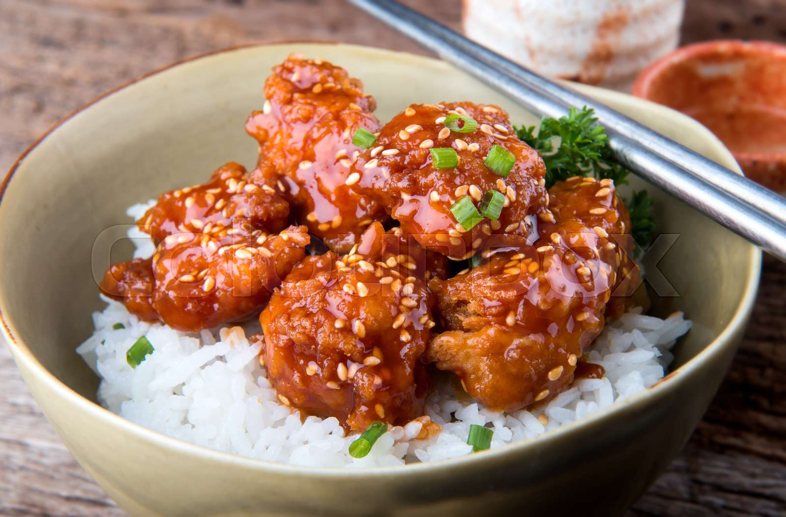 Korean style spicy crispy chicken and rice. | Stock image | Colourbox