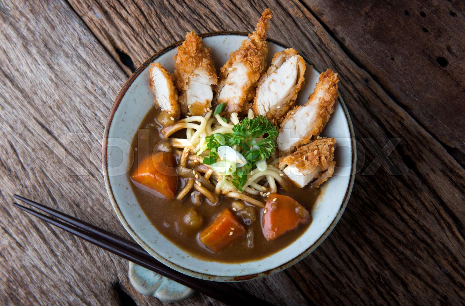 Japanese curry with udon noodle and crispy chicken. Stock image