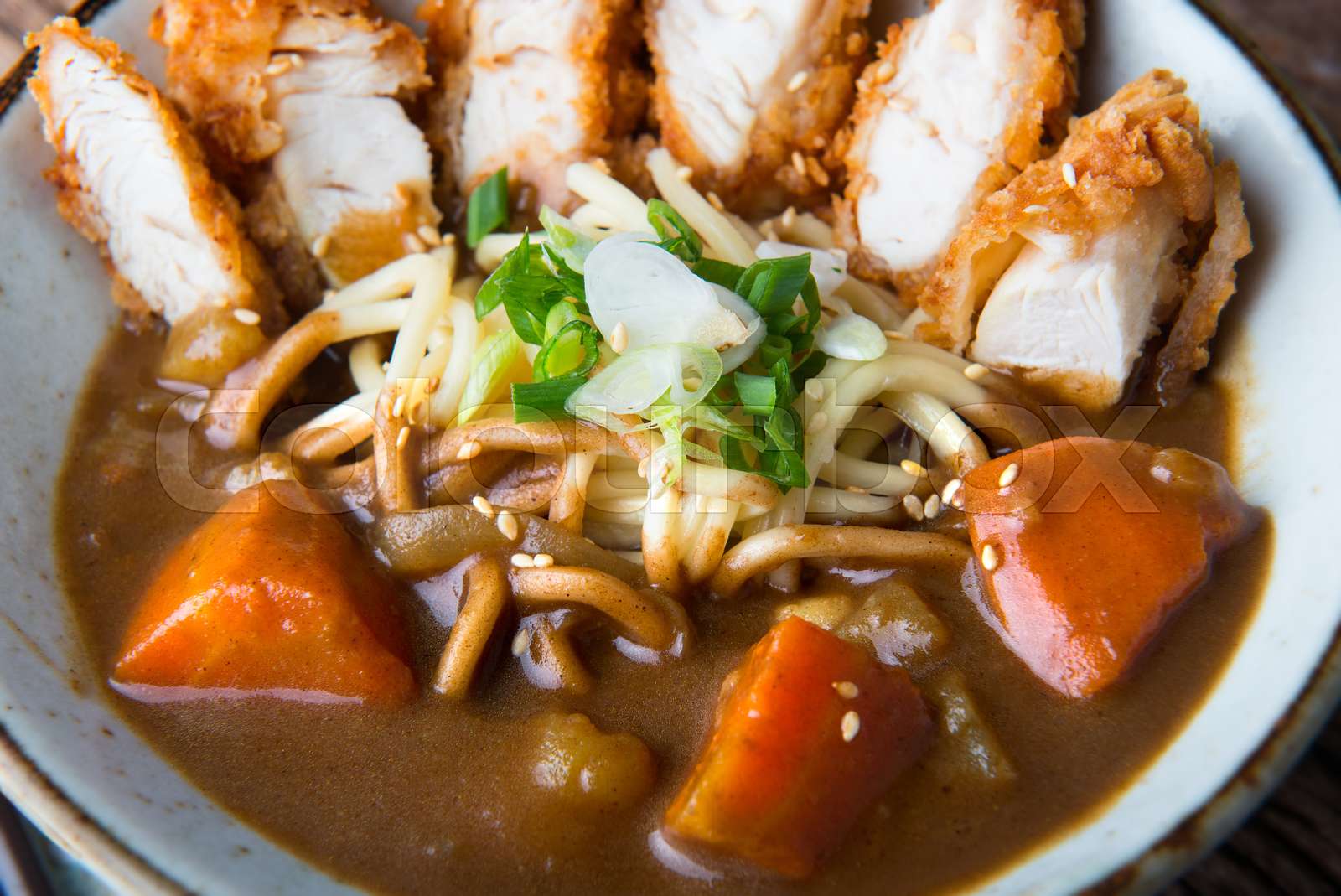Japanese curry with udon noodle and crispy chicken. Stock image