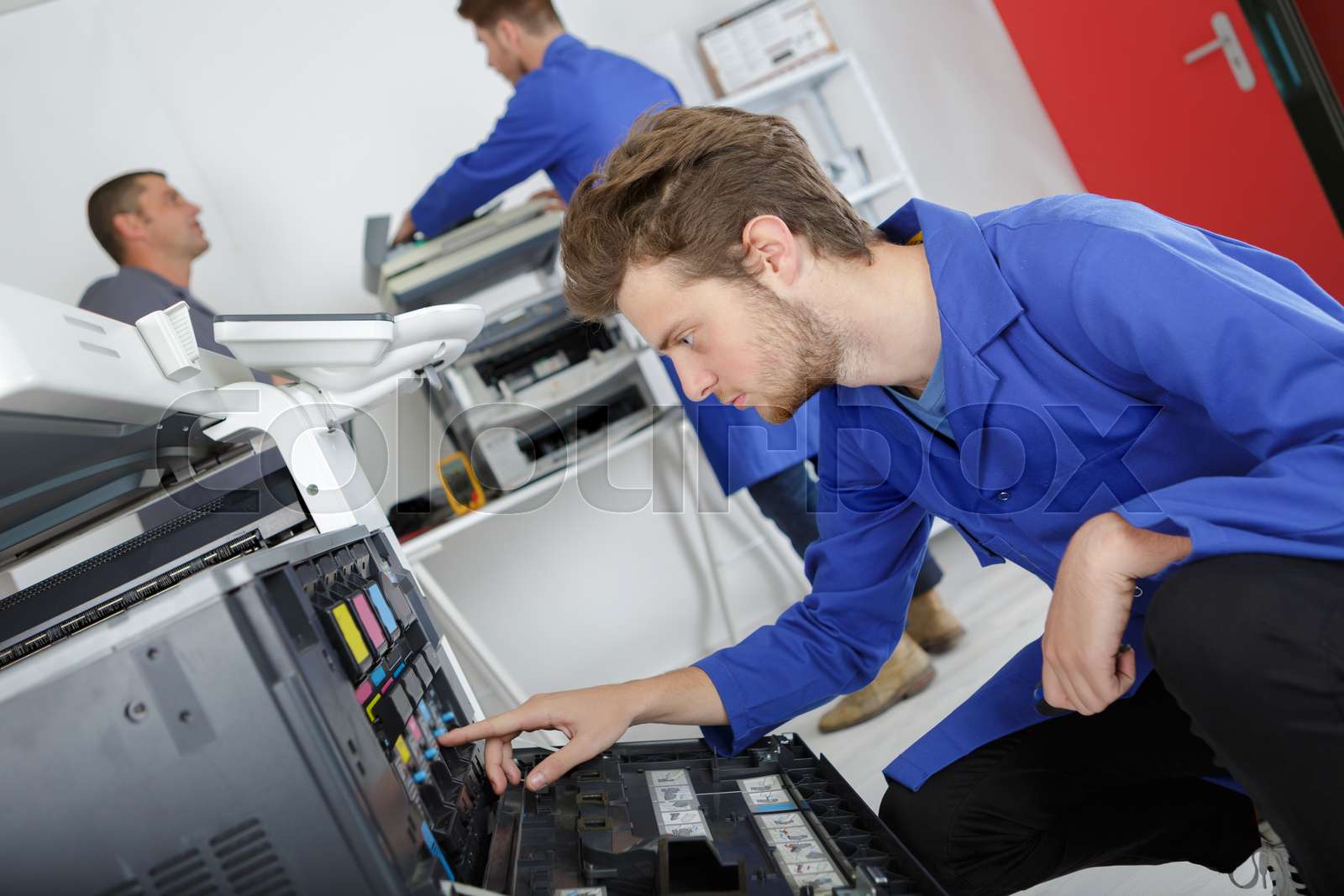 electronic printer technician Stock image Colourbox