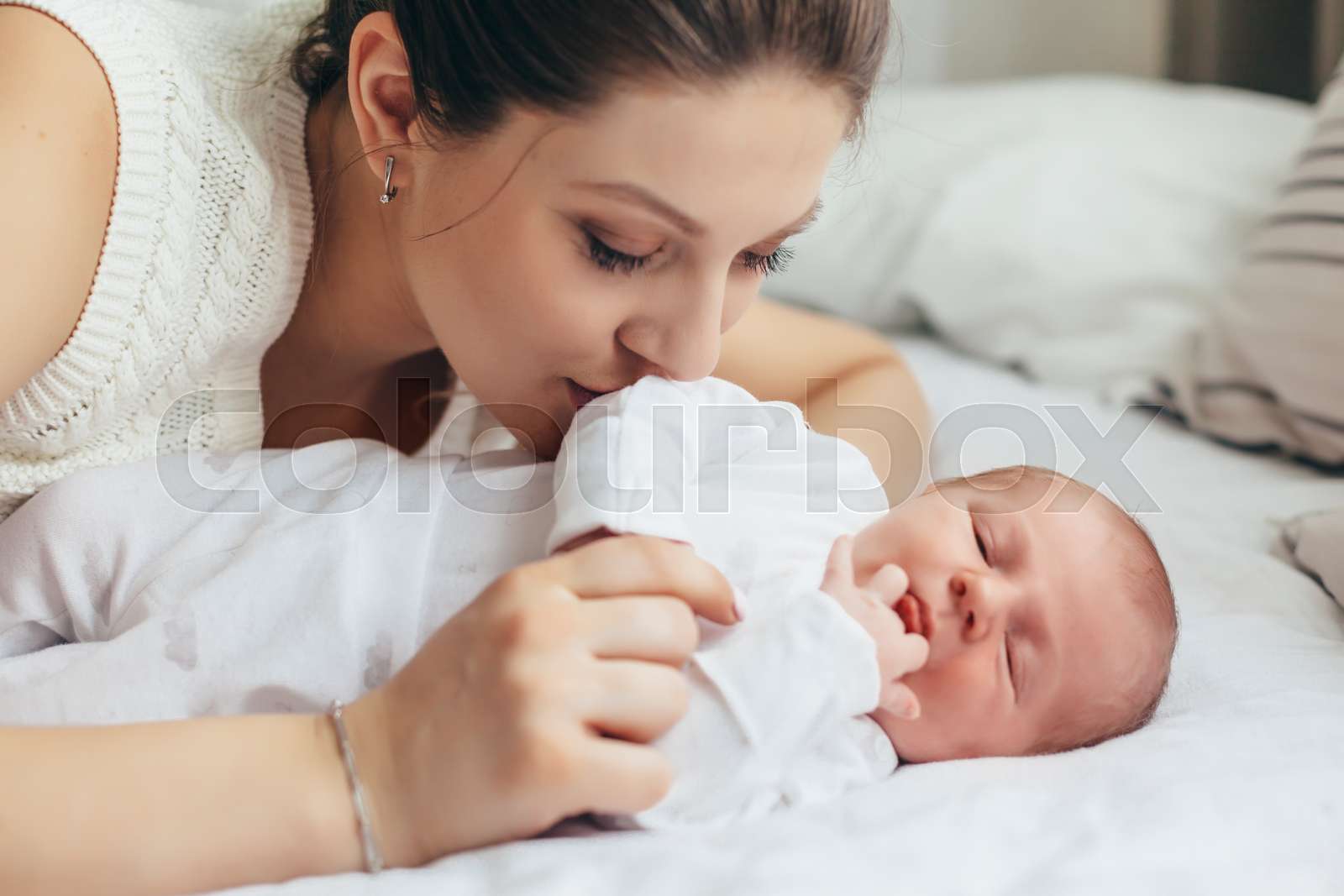 Mom with newborn baby | Stock image | Colourbox