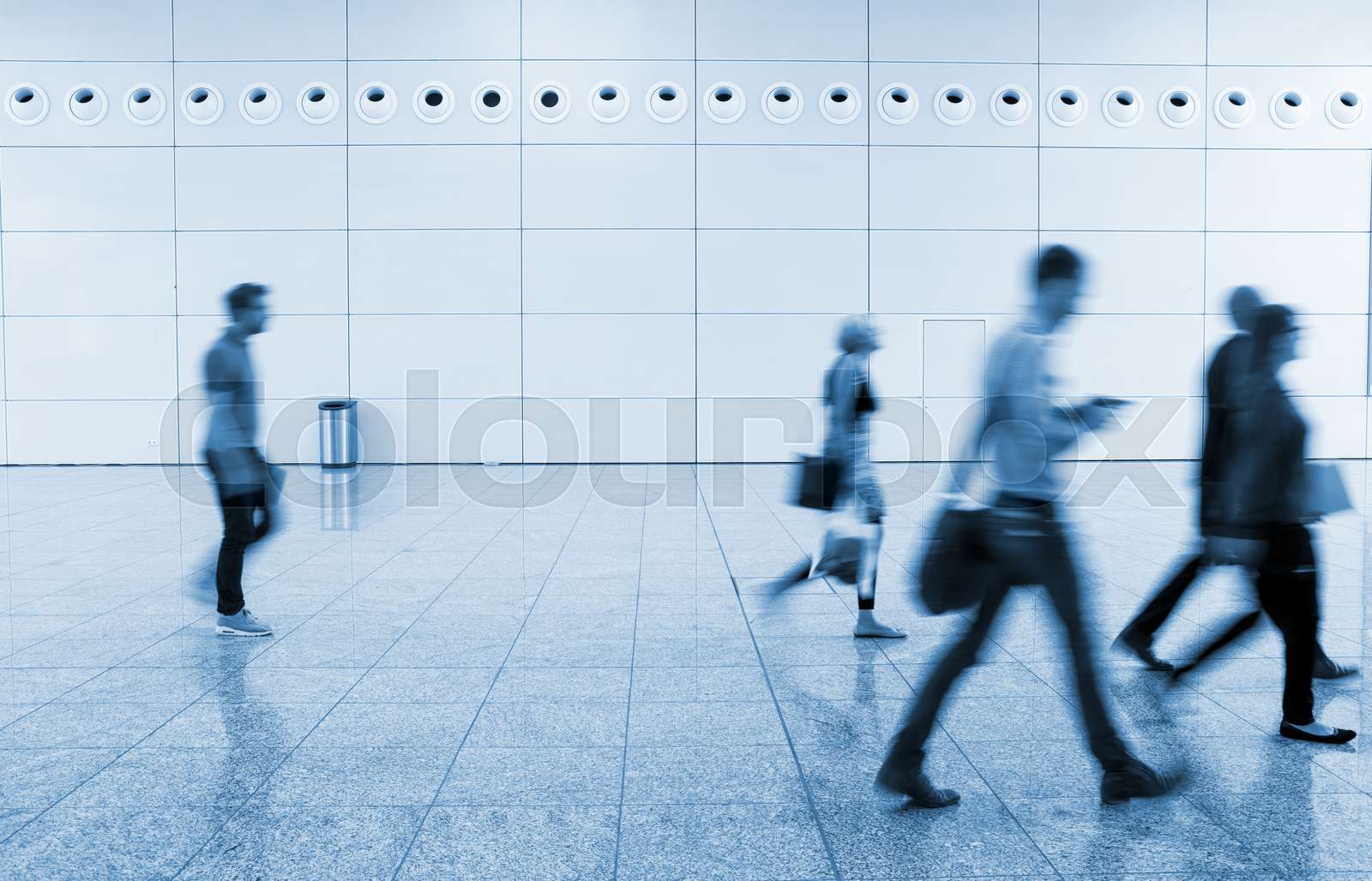 Exhibition walkway with blurred people Stock