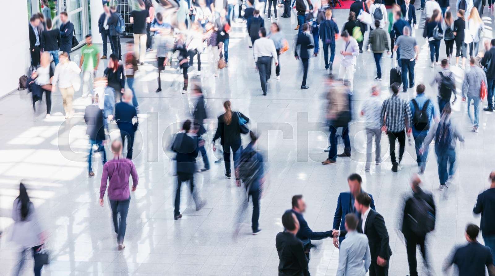 crowd of Blurred business people rushing | Stock image | Colourbox