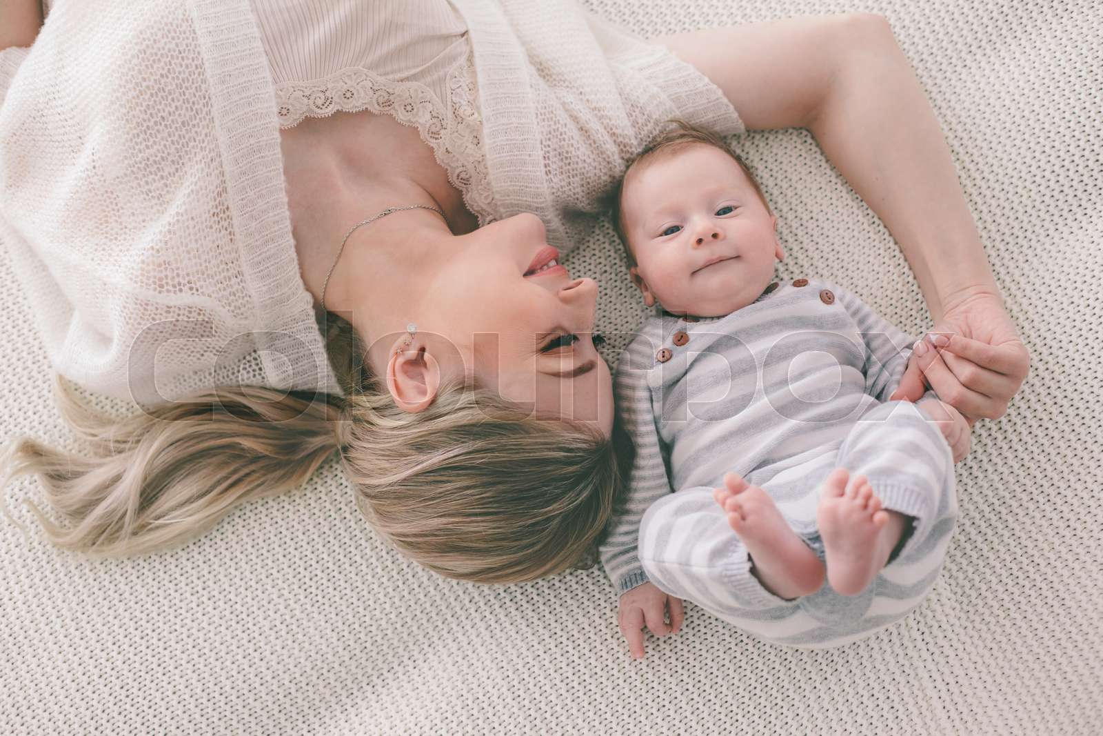 Mom with her 2 month old baby Stock image Colourbox