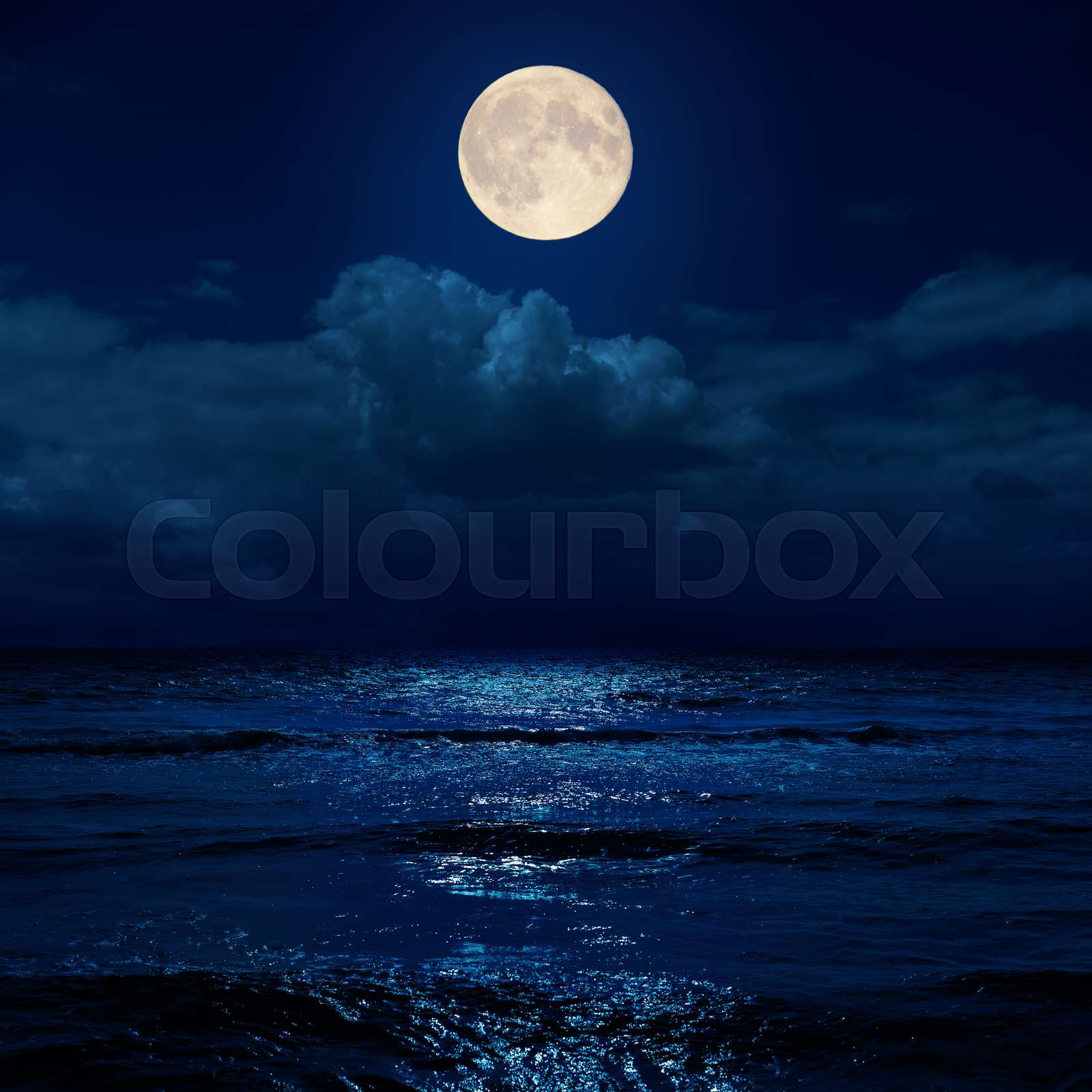Full Moon In Night Over Clouds And Sea With Reflections Stock Image Colourbox