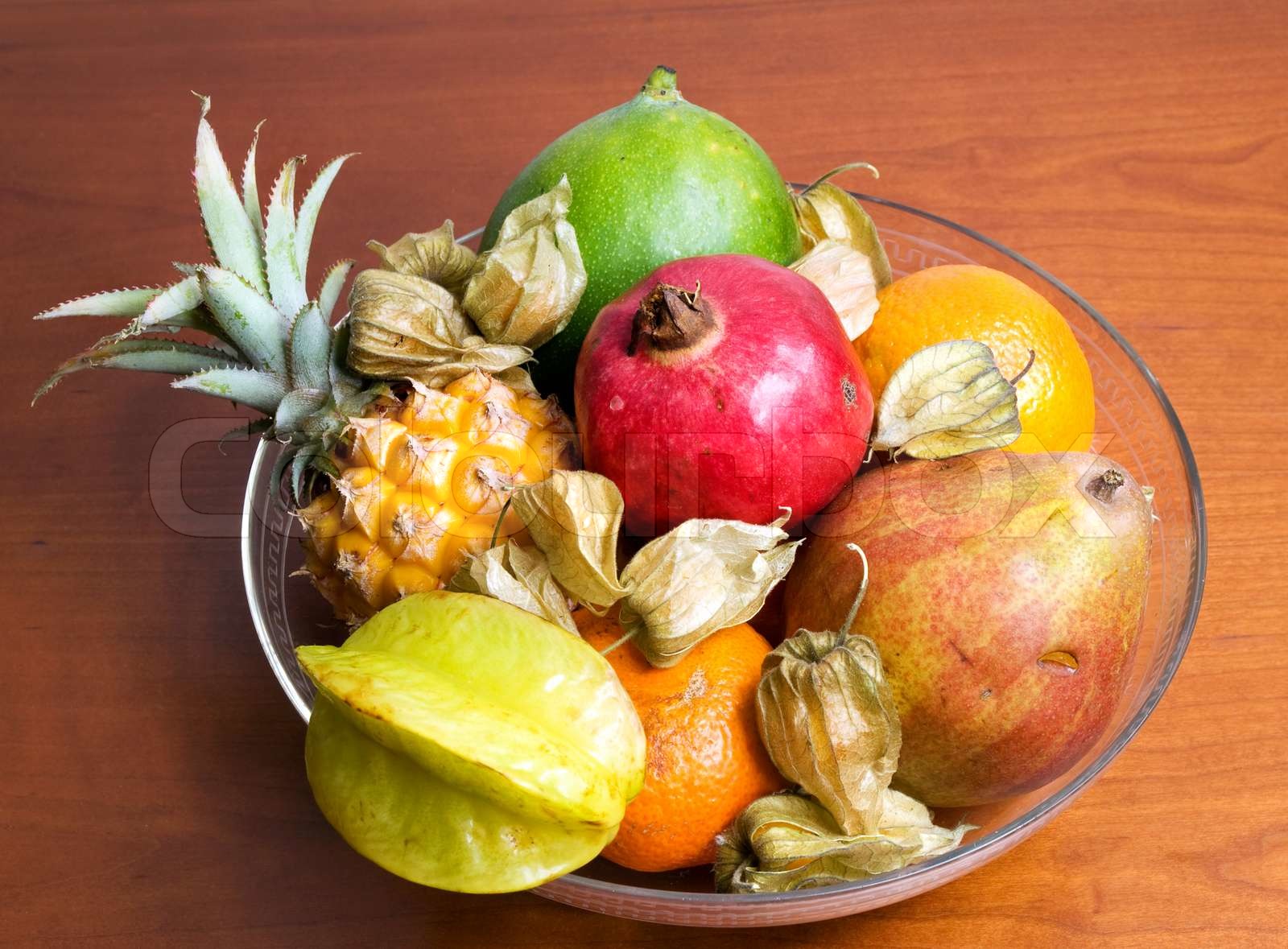 Glasschale mit exotischen Früchten | Stock Bild | Colourbox