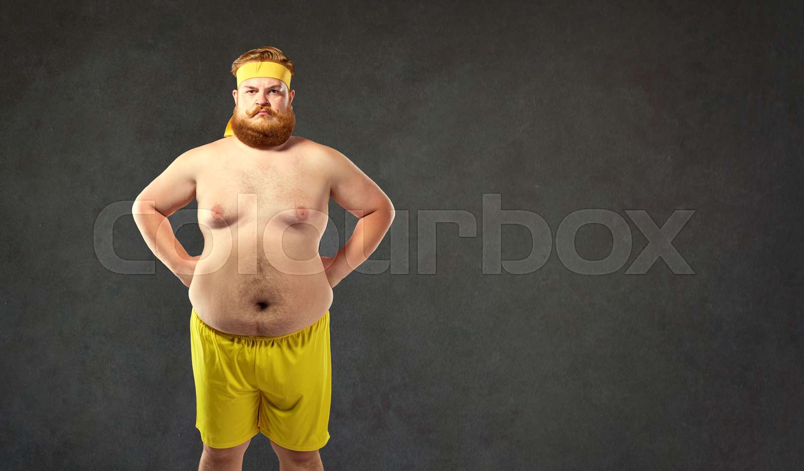Funny fat naked man in sportswear Stock image Colourbox