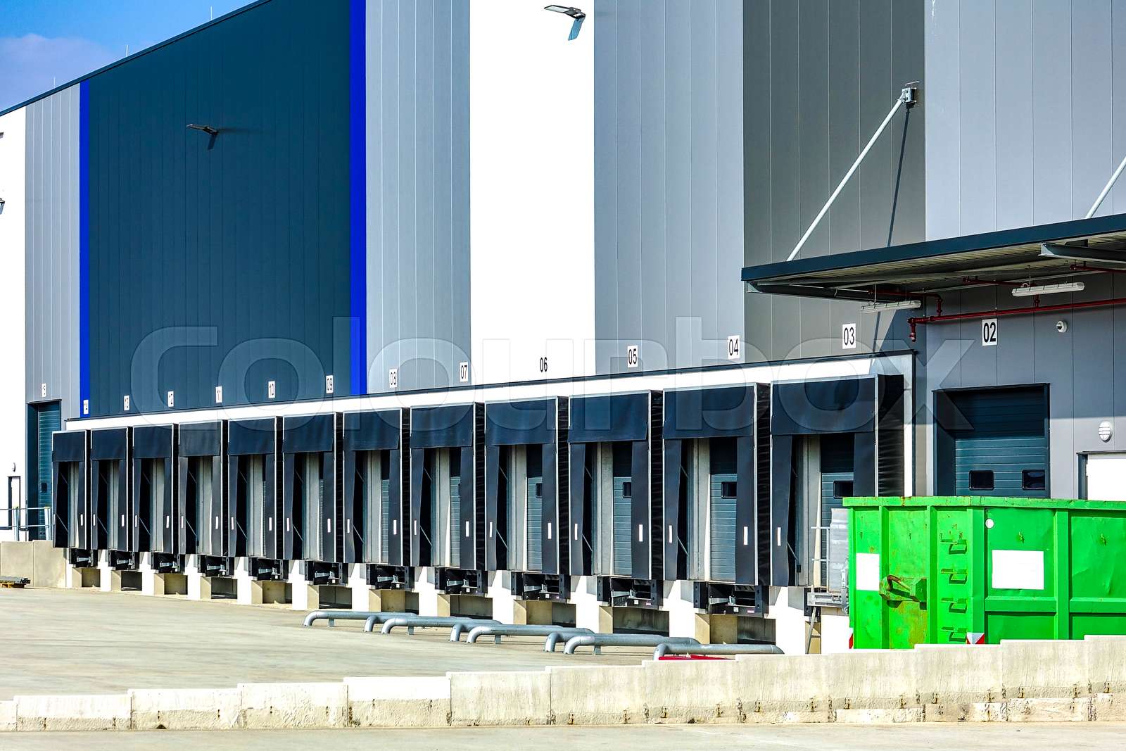 Commercial warehouse with multiple loading bays | Stock image | Colourbox