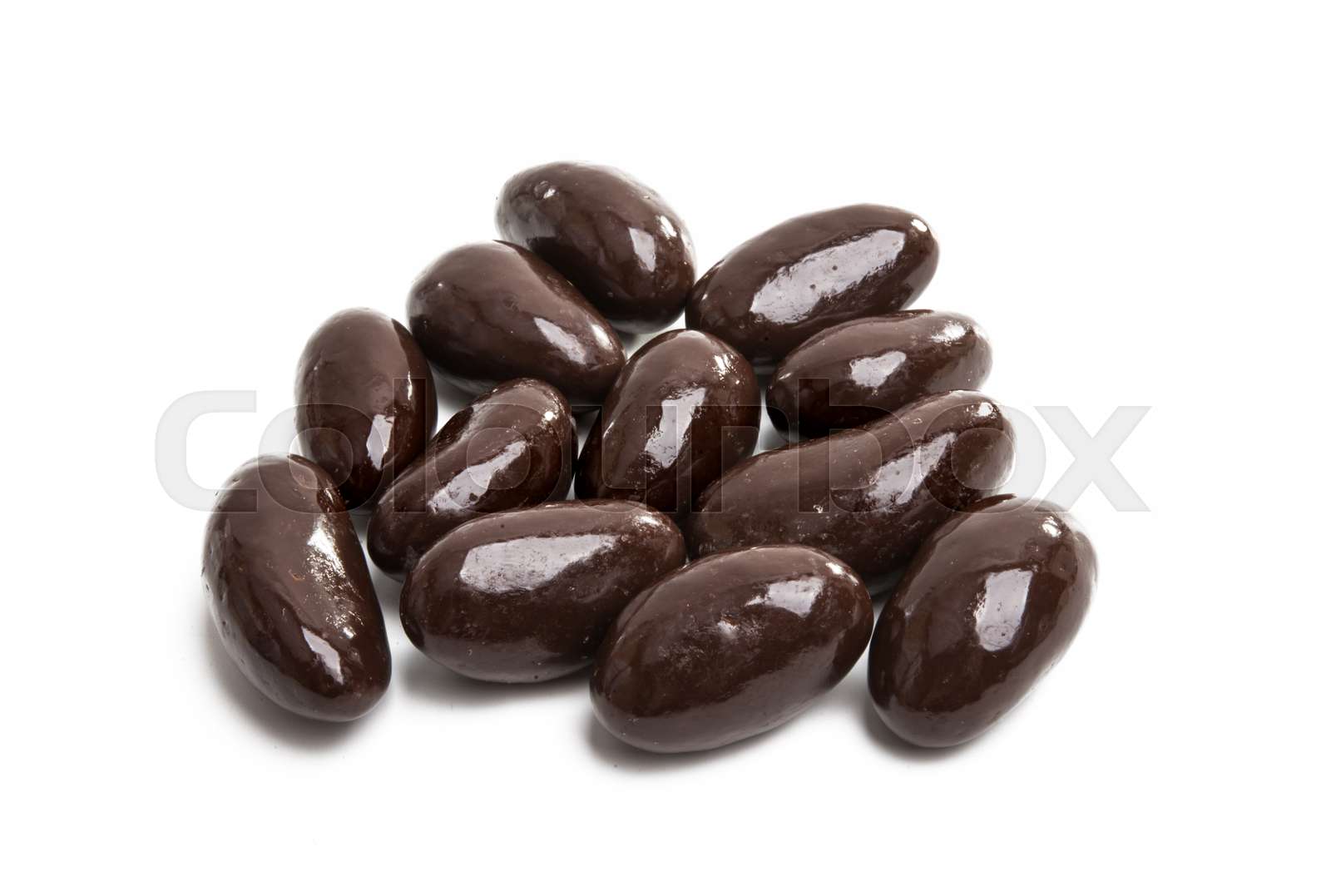 nuts in chocolate isolated | Stock image | Colourbox