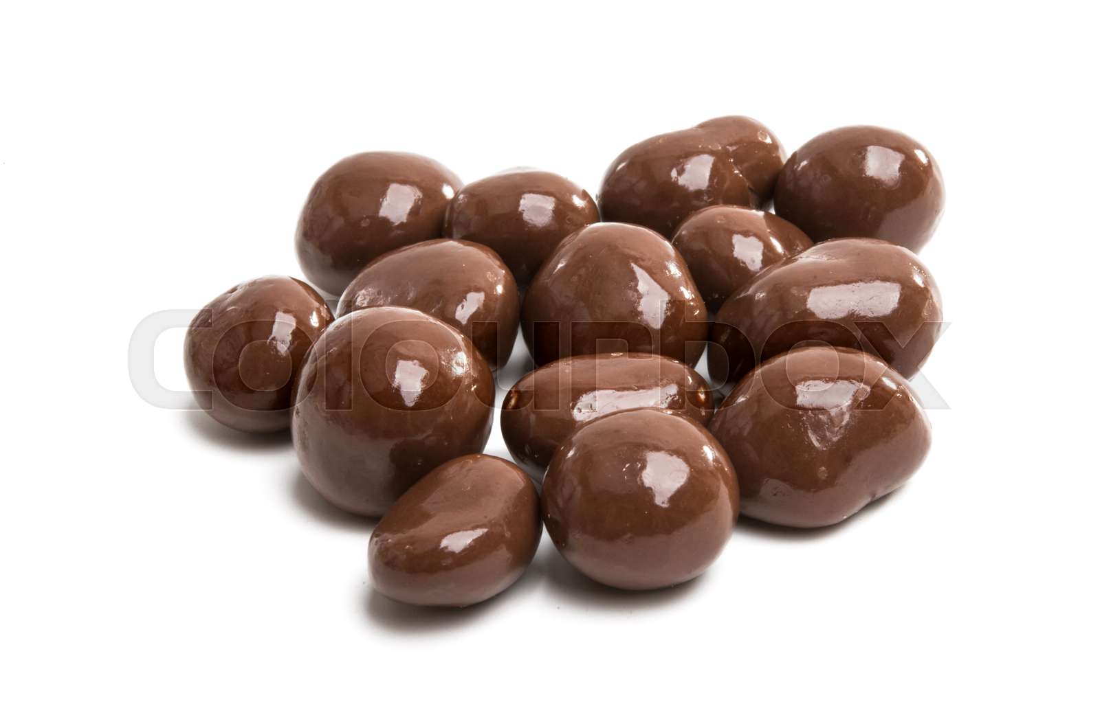 nuts in chocolate isolated | Stock image | Colourbox