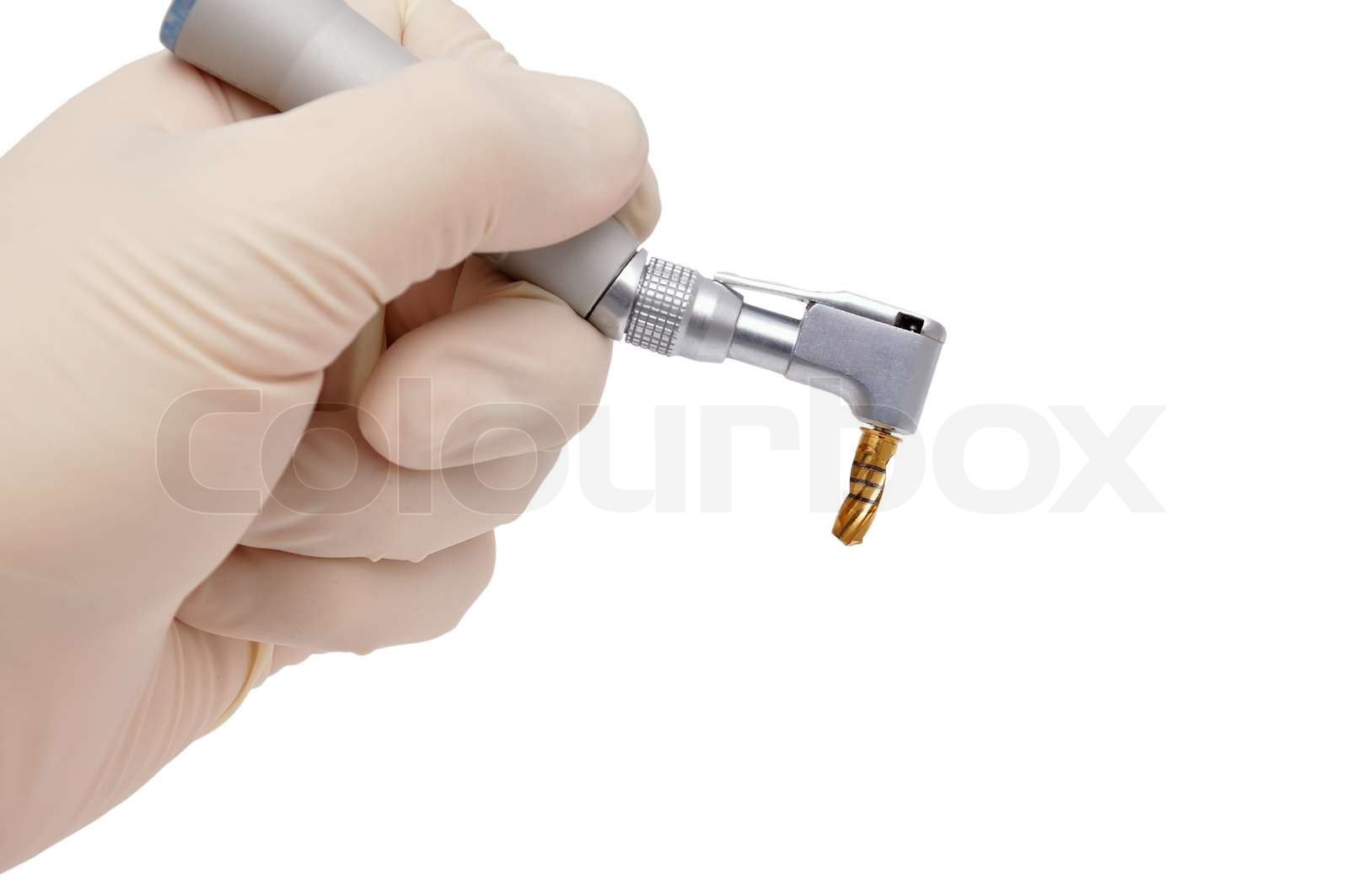 dental drill in hand at the dentist Stock image Colourbox