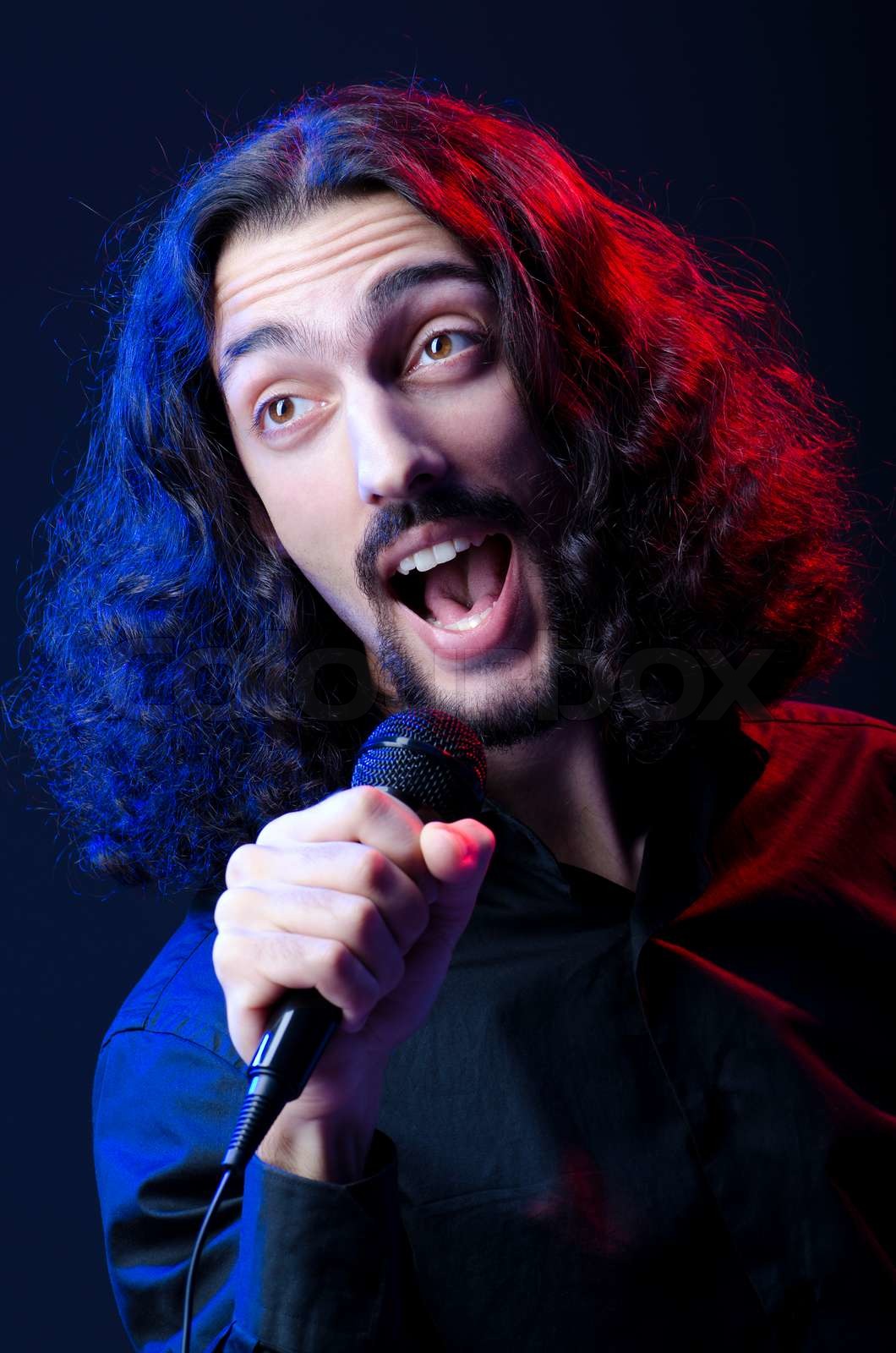 Man singt beim Konzert Stock Bild Colourbox