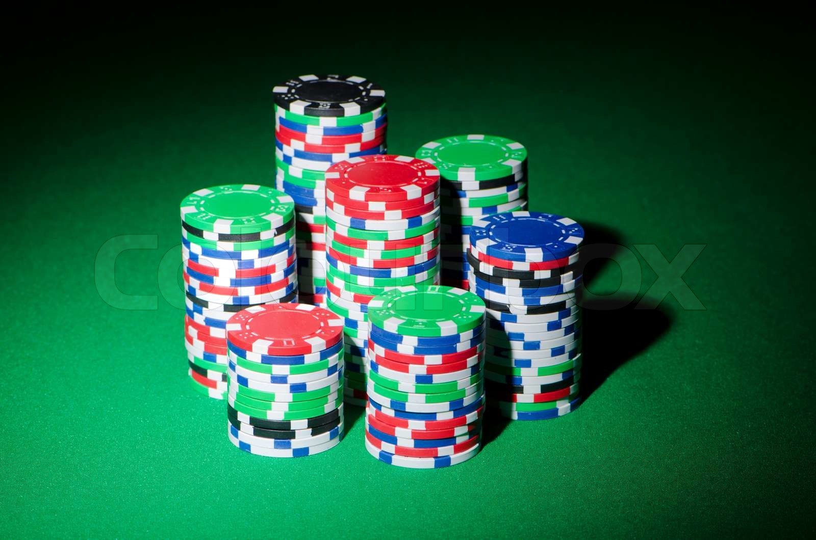 Stack of casion chips on table | Stock image | Colourbox