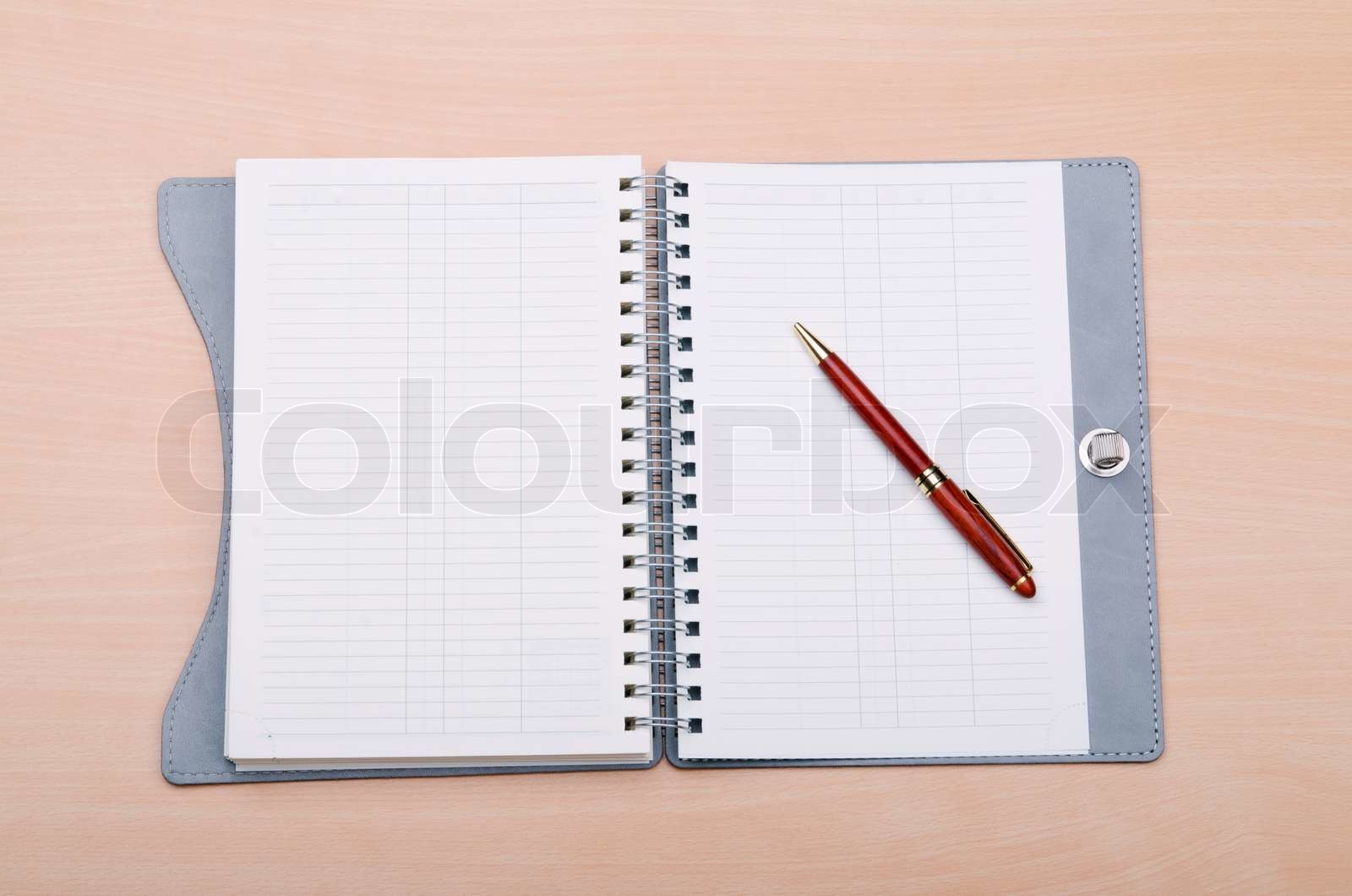 Writing pen on the blank page | Stock image | Colourbox