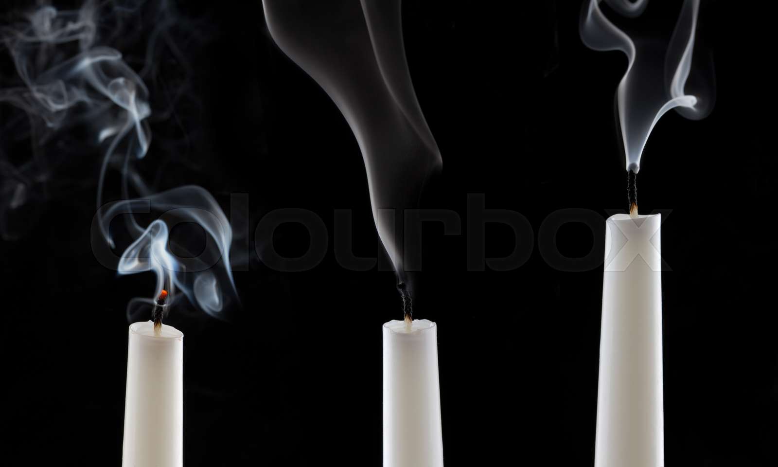 extinguished candle with smoke Stock image Colourbox