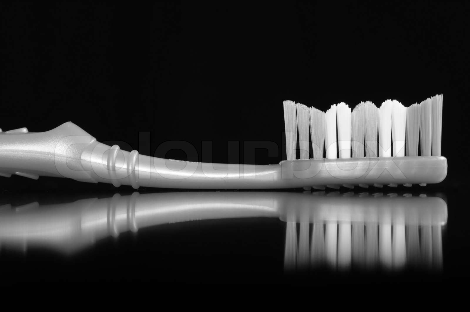 Toothbrush on Black Background | Stock image | Colourbox
