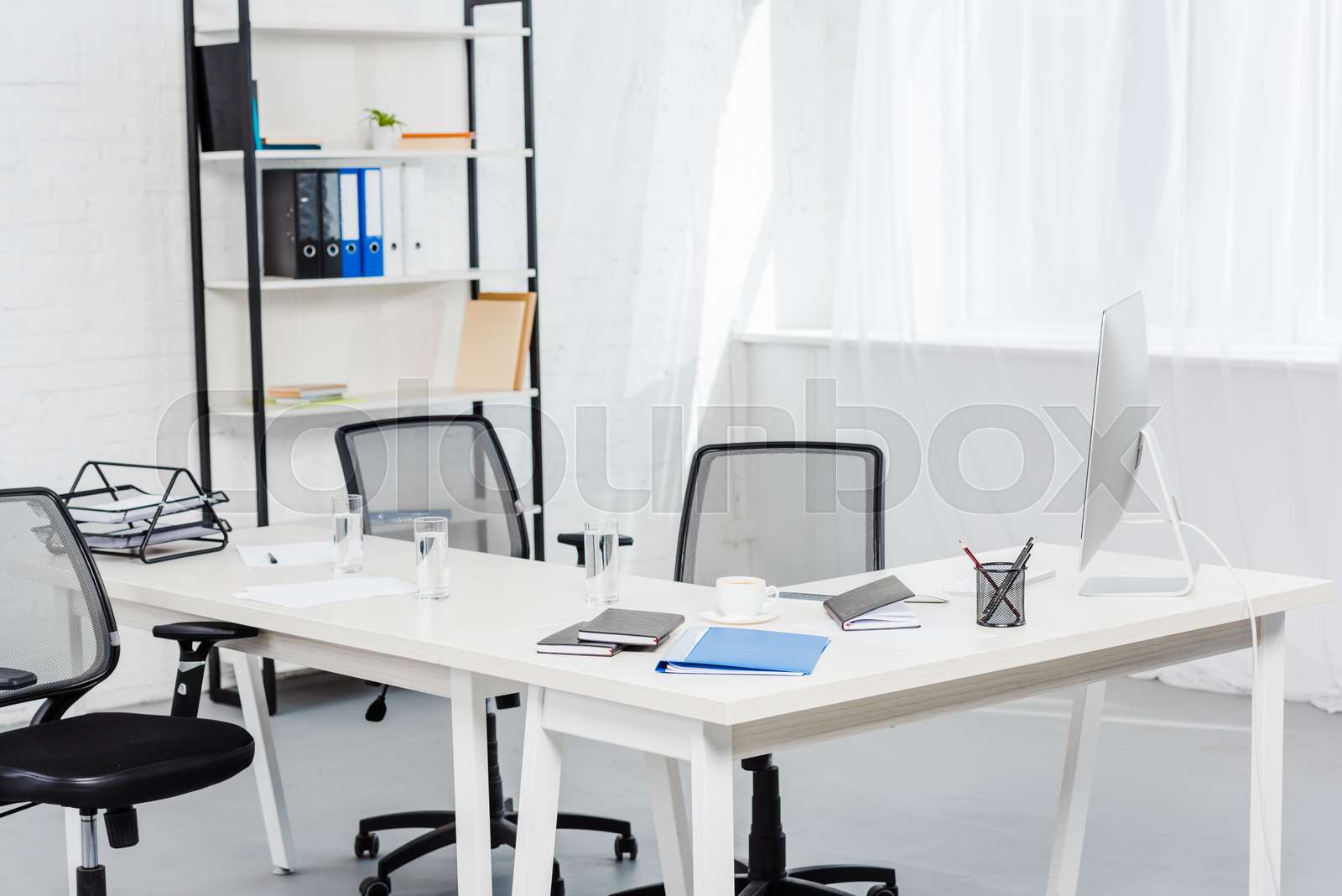 interior of empty office with computer on desk | Stock image | Colourbox