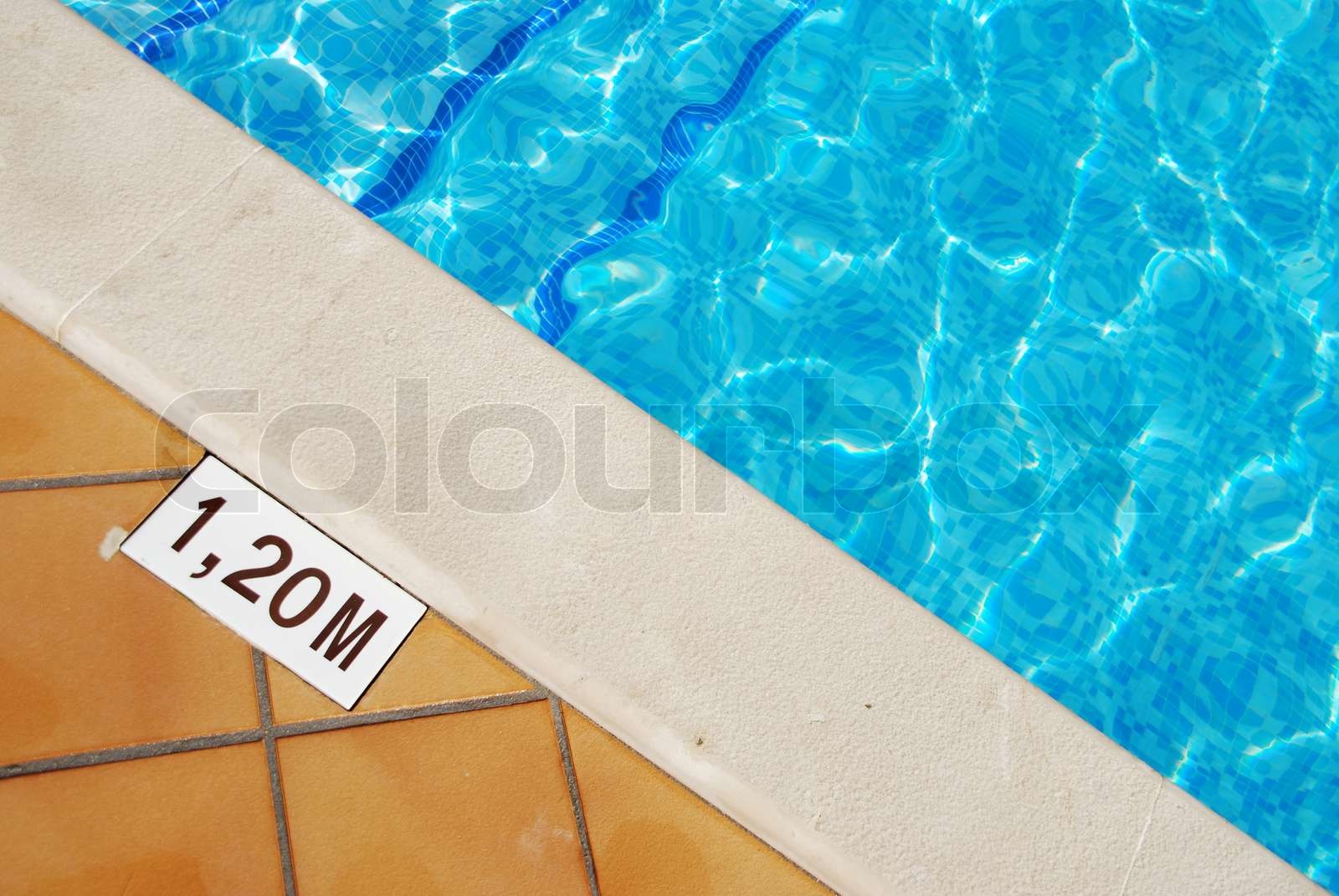 Pool depth sign at the edge of the swimming pool | Stock image | Colourbox