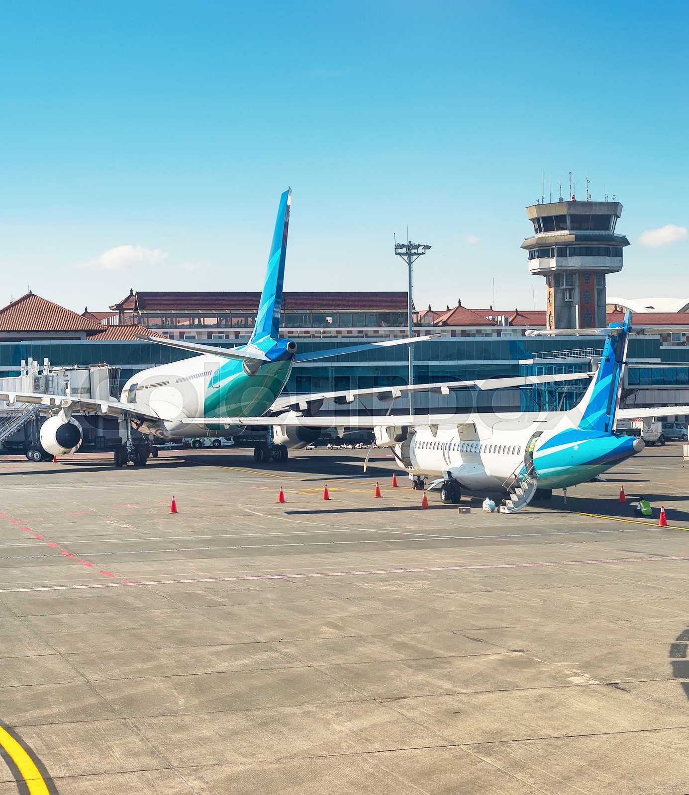 Airplanes at runway, Denpasar airport, Bali Stock image Colourbox