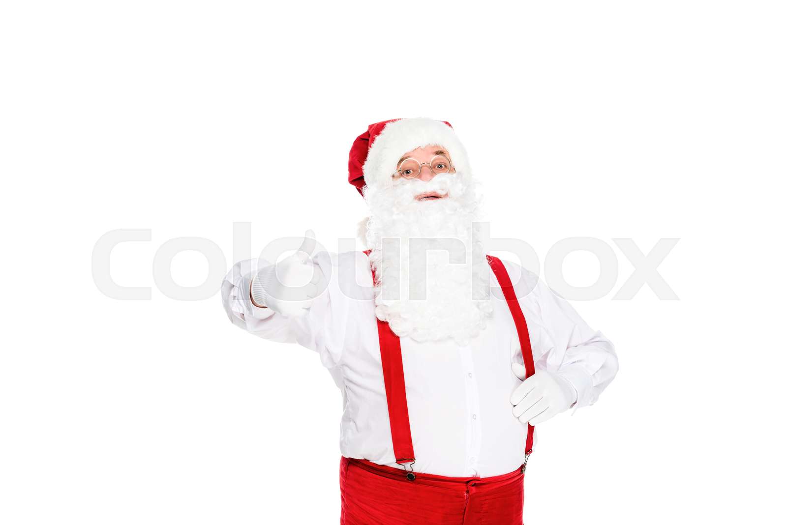 santa claus in suspenders showing thumb up isolated on white | Stock
