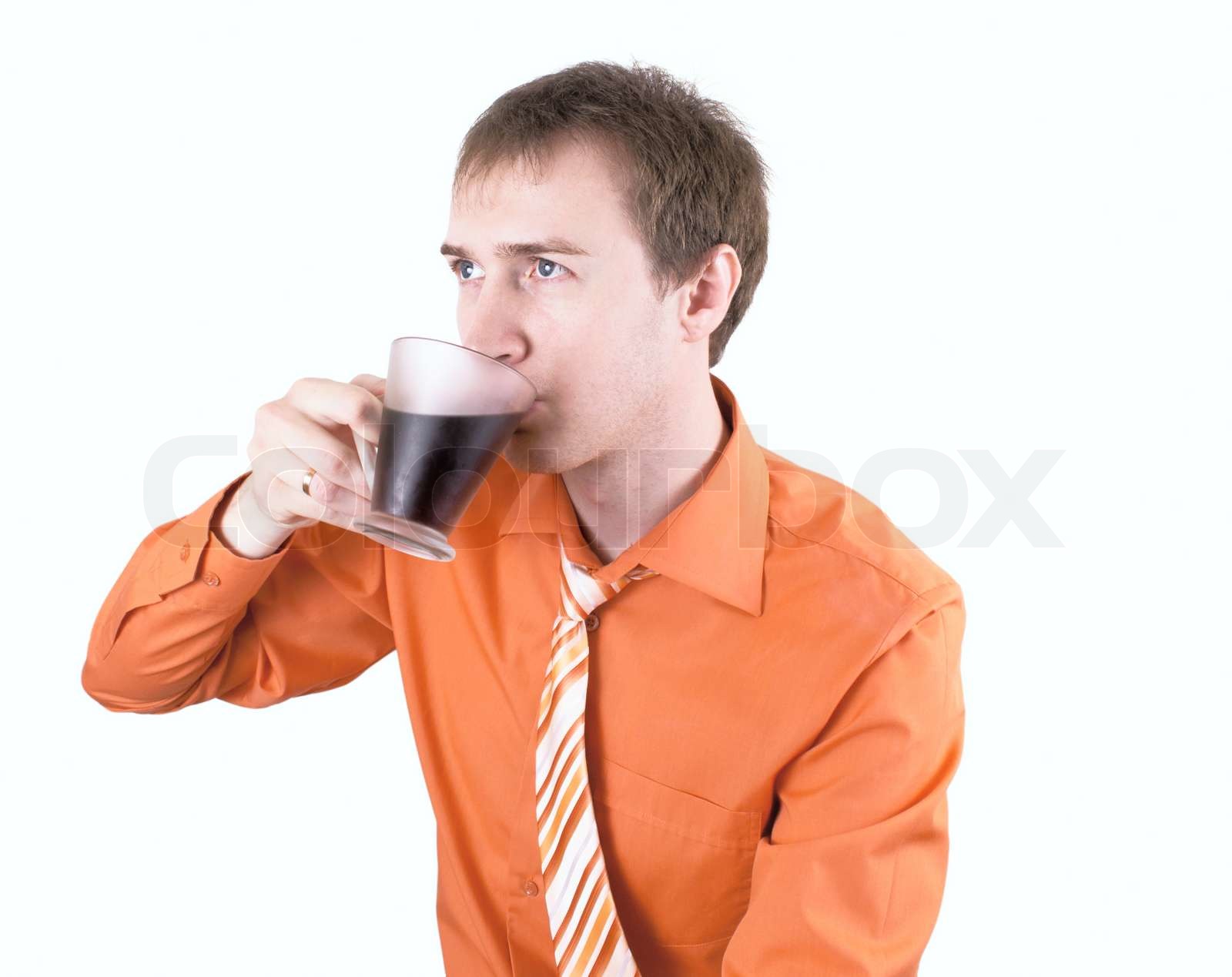 Junger Mann Trinkt Kaffee Auf Einem Wei en Stock Bild Colourbox