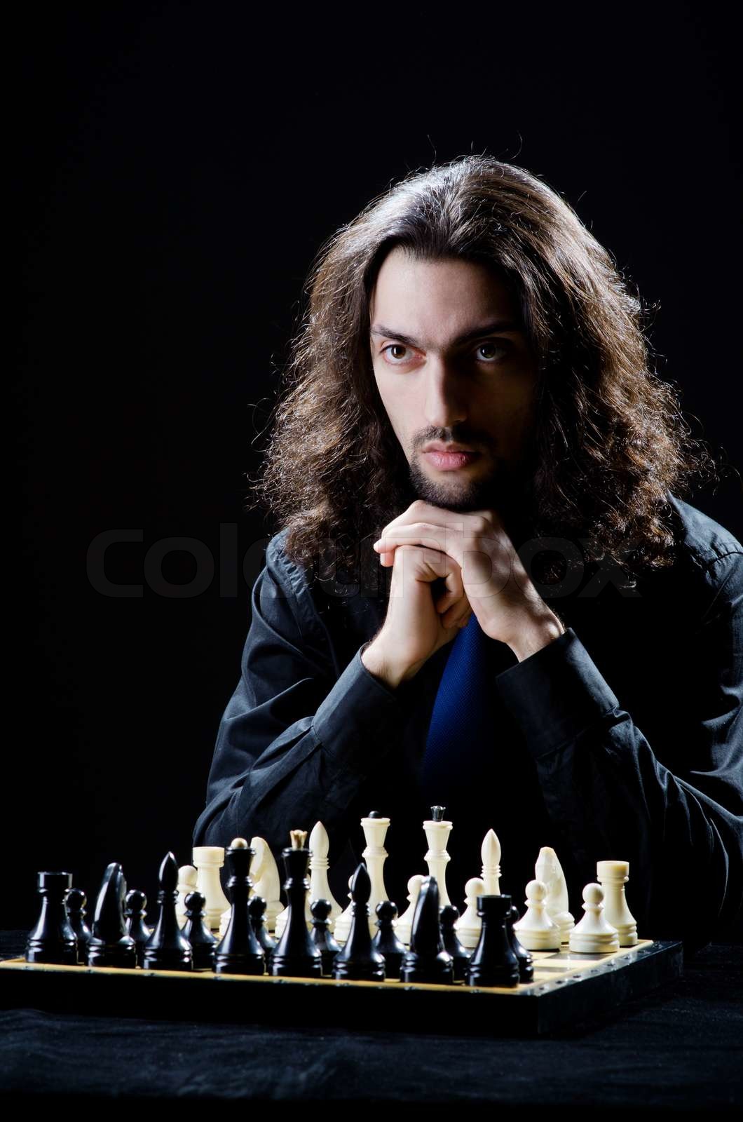 Schachspieler spielen sein Spiel Stock Bild Colourbox