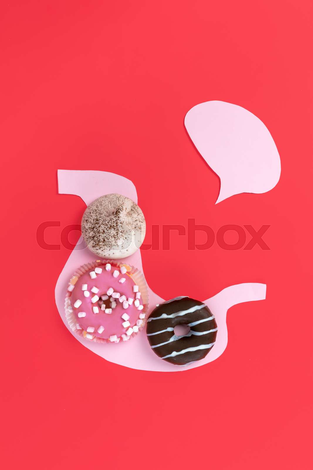 Cookies on pink stomach stock image colourbox